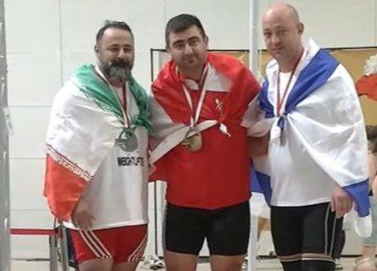 عکس یادگاری دردسرساز وزنه بردار ایرانی با ورزشکار اسرائیلی