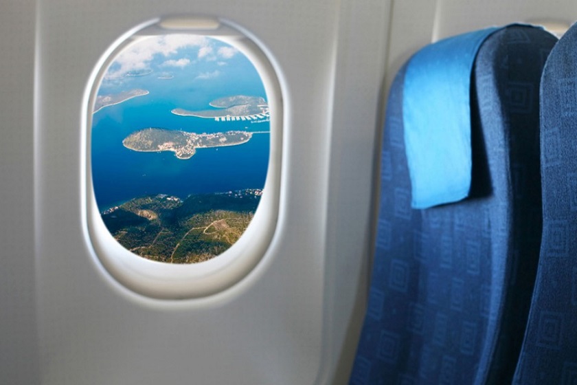 چرا پنجره های هواپیما گرد است؟ چرا پنجره های هواپیما گرد است؟