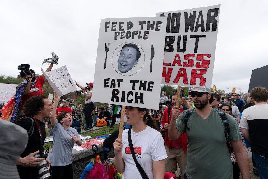 اعتراض آمریکایی ها علیه سیاستهای ترامپ و ماسک +عکس اعتراض آمریکایی ها علیه سیاستهای ترامپ و ماسک +عکس